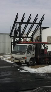 Erection crews put the finishing touches on the steel canopies.